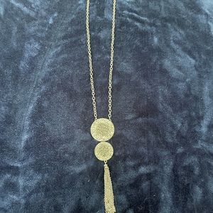 Long silver tone necklace with pendants